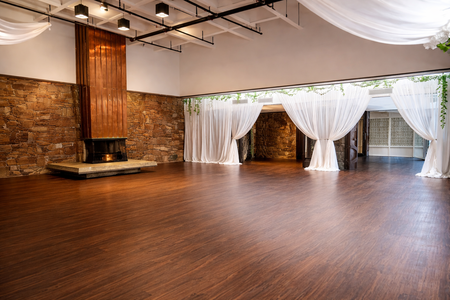 Fireside Room with fireplace and reception setup at Oasis Grand Hall